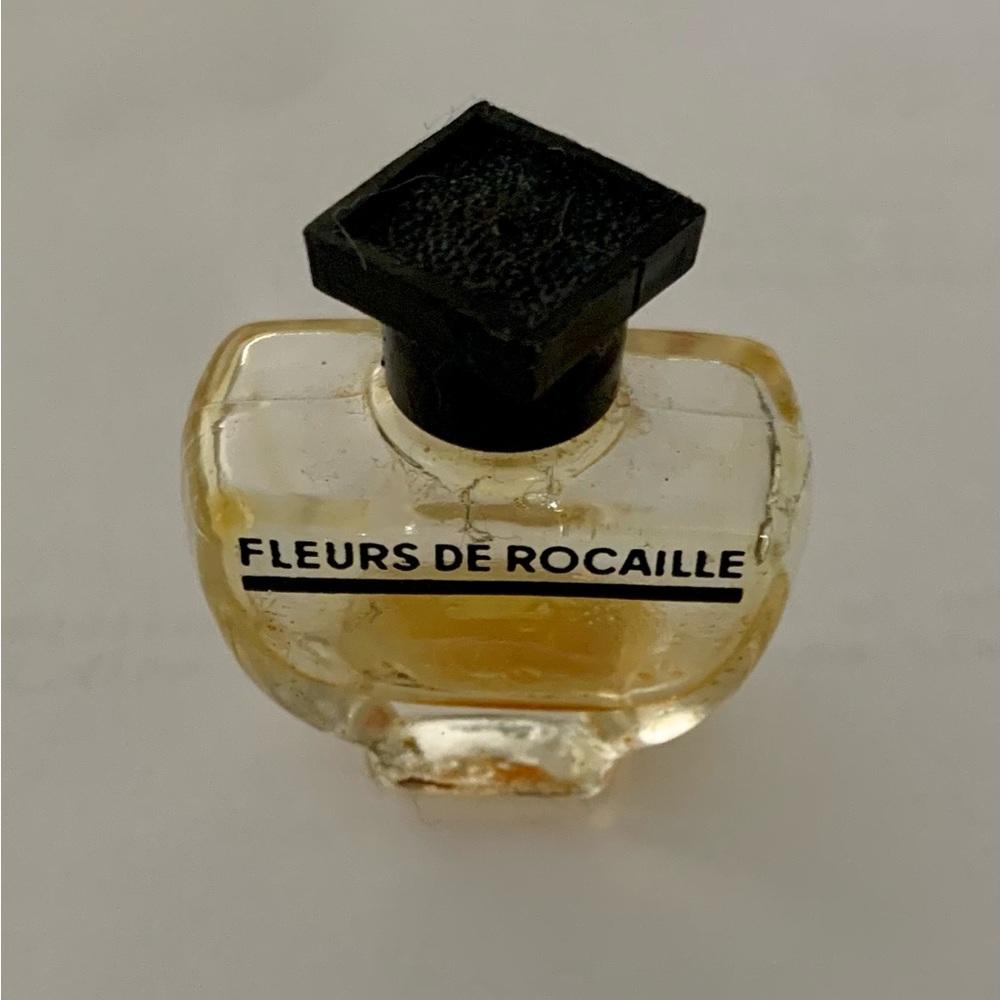 CARON, FLEUR DE ROCAILLE EMPTY MINI BOTTLE. COLLECTIBLE - Picture 2 of 2